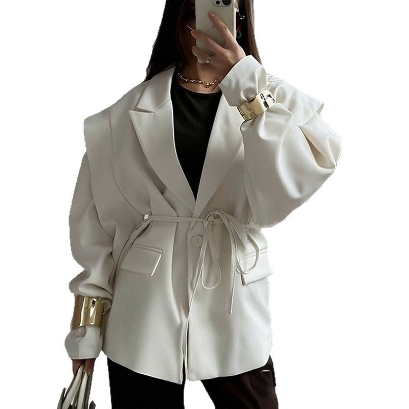 Oversized belted blazer with puff sleeves – Modern and sophisticated elegance