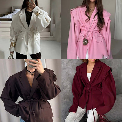 Oversized belted blazer with puff sleeves – Modern and sophisticated elegance