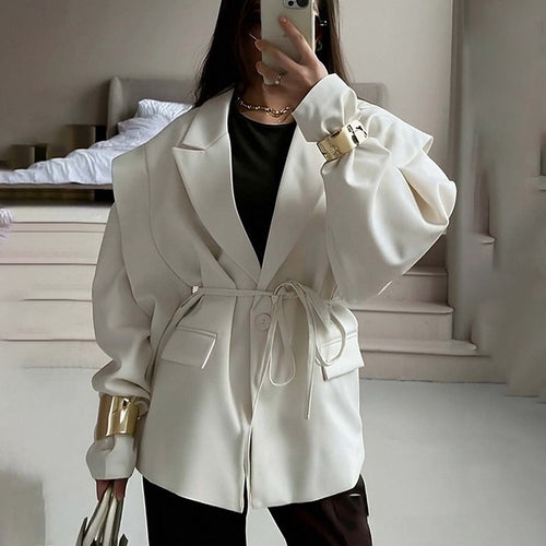 Oversized belted blazer with puff sleeves – Modern and sophisticated elegance